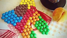 Зуб из M&M