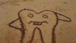 Зуб из песка 9