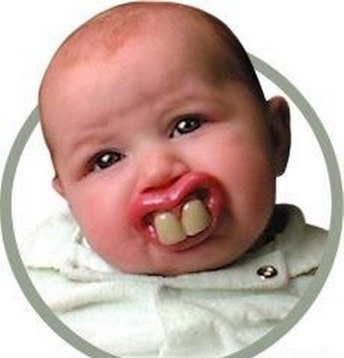 детская соска с зубами