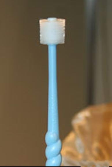 Зубная щетка в форме цилиндра
